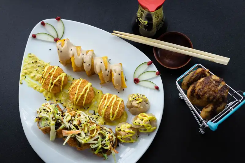 Modern fusion biryani dish with sushi elements