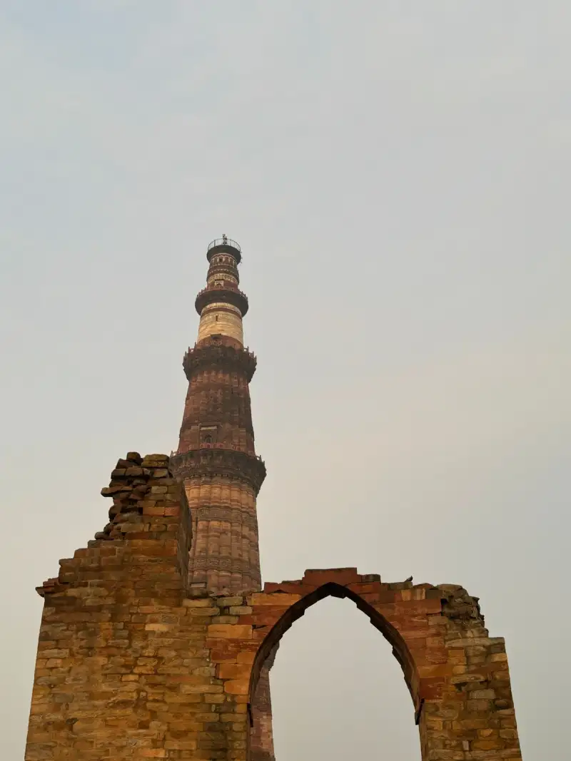 Kutlug-Timur Minaret soaring above Konye-Urgench ruins under a stark blue Turkmenistan sky