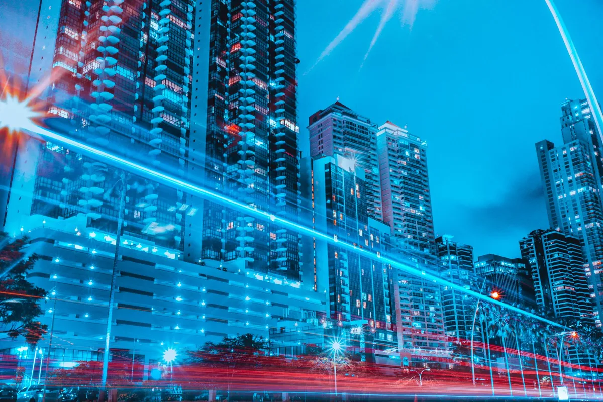 Image of a futuristic cityscape with wireless signals