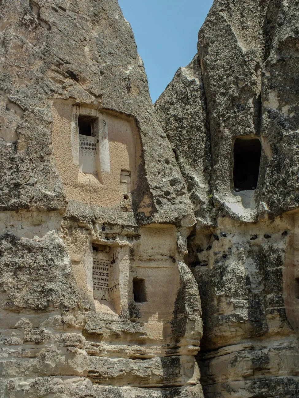 Ancient rock-cut church in Göreme Open-Air Museum with frescoes