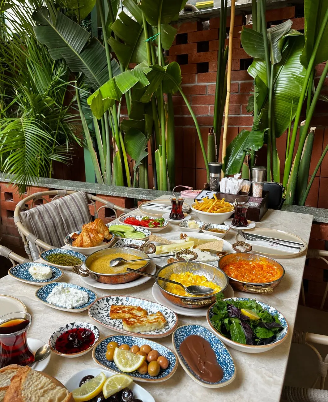 Traditional Turkish breakfast spread with cheeses, olives, and fresh bread