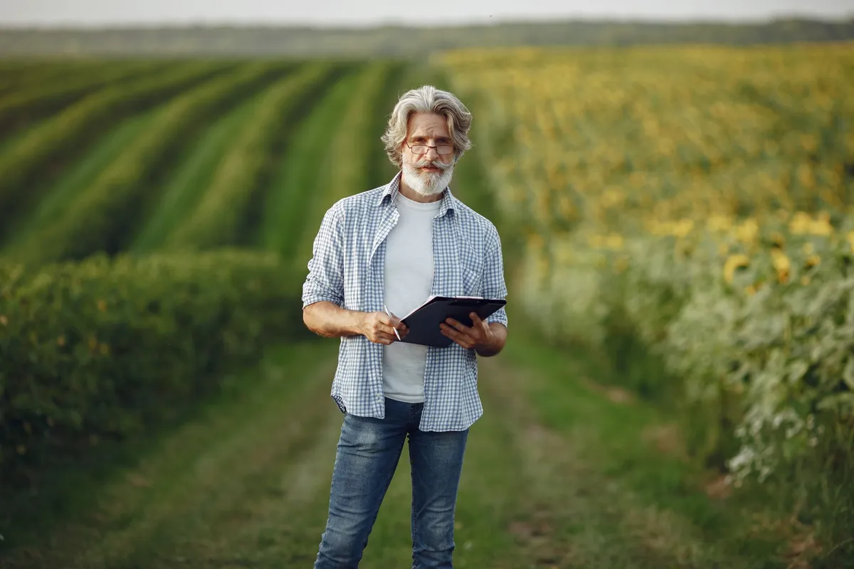 Farm manager reviewing AI dashboard on tablet
