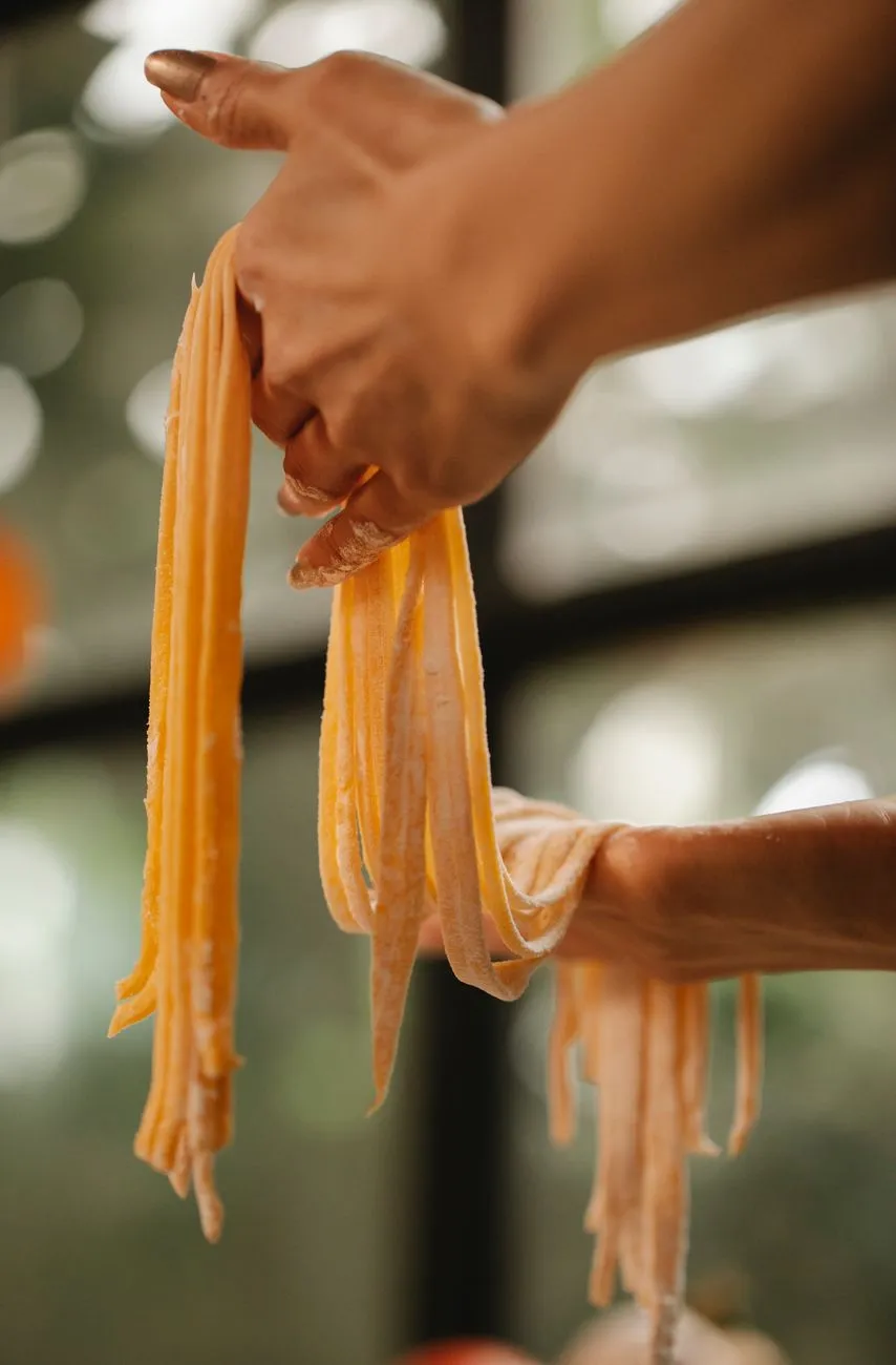 Traditional italian pasta making hands