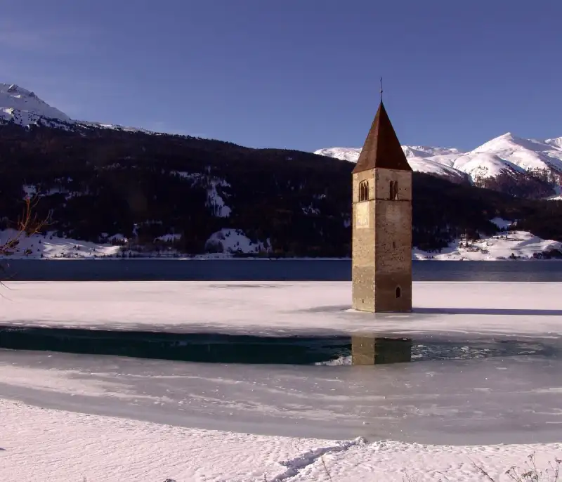Echoes from the Deep: Unveiling the Drowned Villages Beneath Italy's Lake Reschen