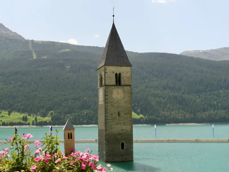 Close up view of the 14th-century submerged Romanesque bell tower of Altgraun in Lake Reschen