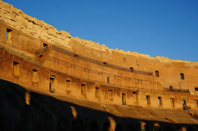 Ancient Roman architectural blueprint of the Colosseum construction site, detailed engineering plans, 1st century AD, historical reconstruction, sepia tone