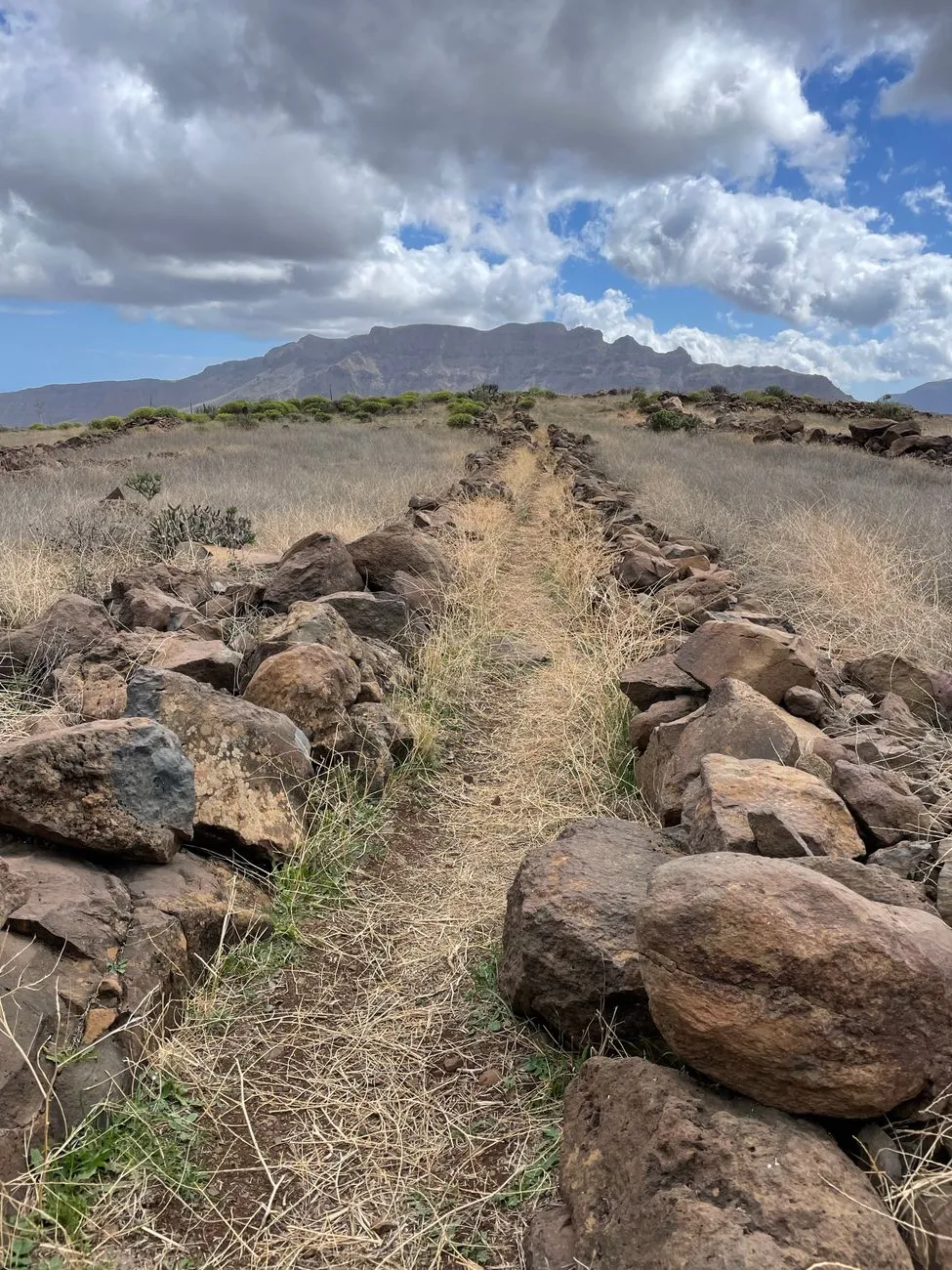 Hikers on a high mountain trail