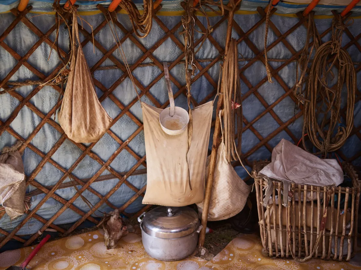 Family inside a traditional yurt