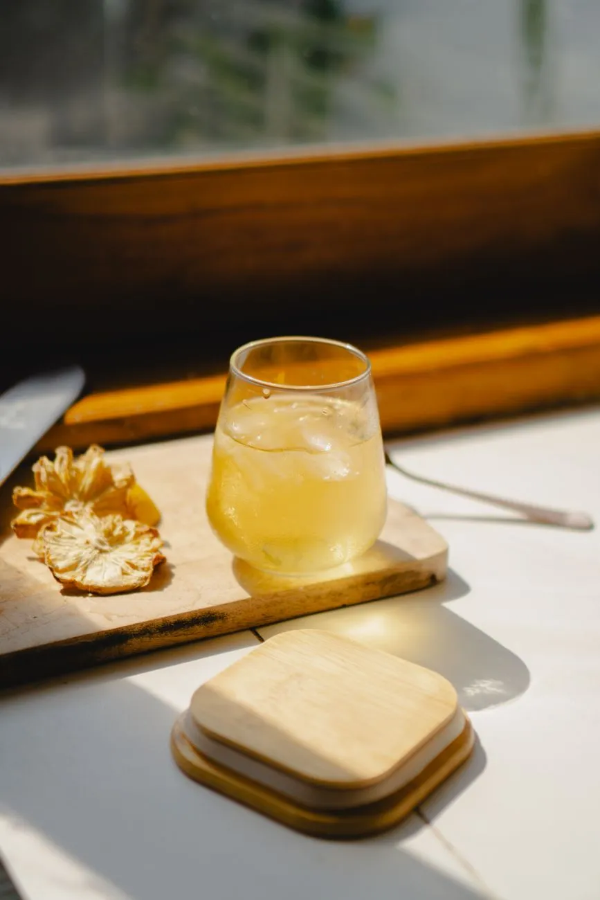 Jun SCOBY floating in a glass jar