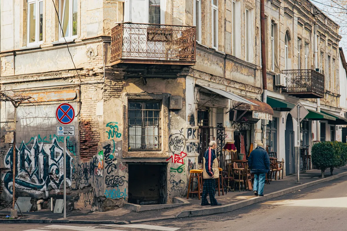 Aerial view of Tbilisi's historic old town with modern cafés