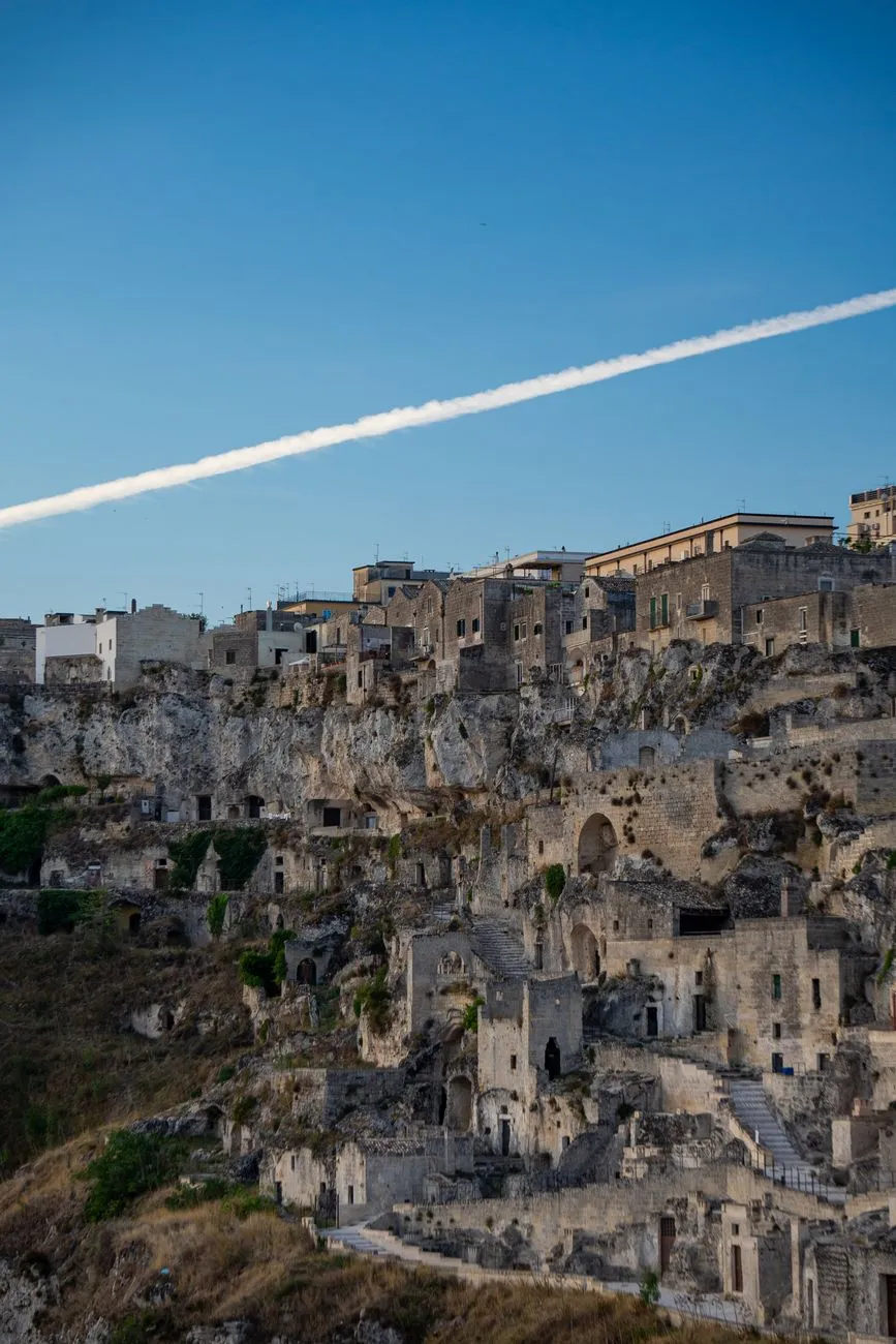 Hidden alley in Matera with ancient cave dwellings