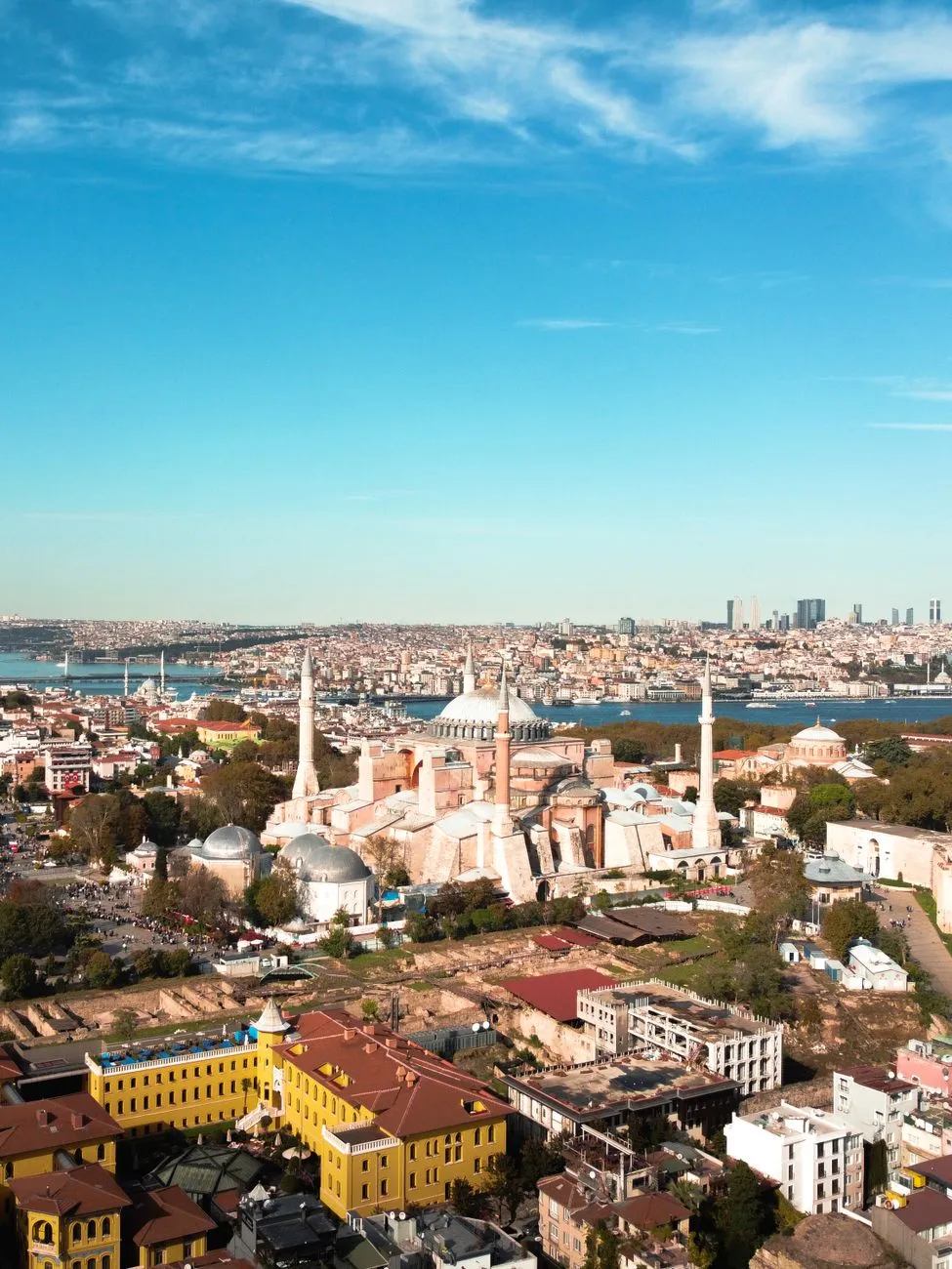 Istanbul's skyline at dusk with Hagia Sophia and Blue Mosque silhouetted against the sky