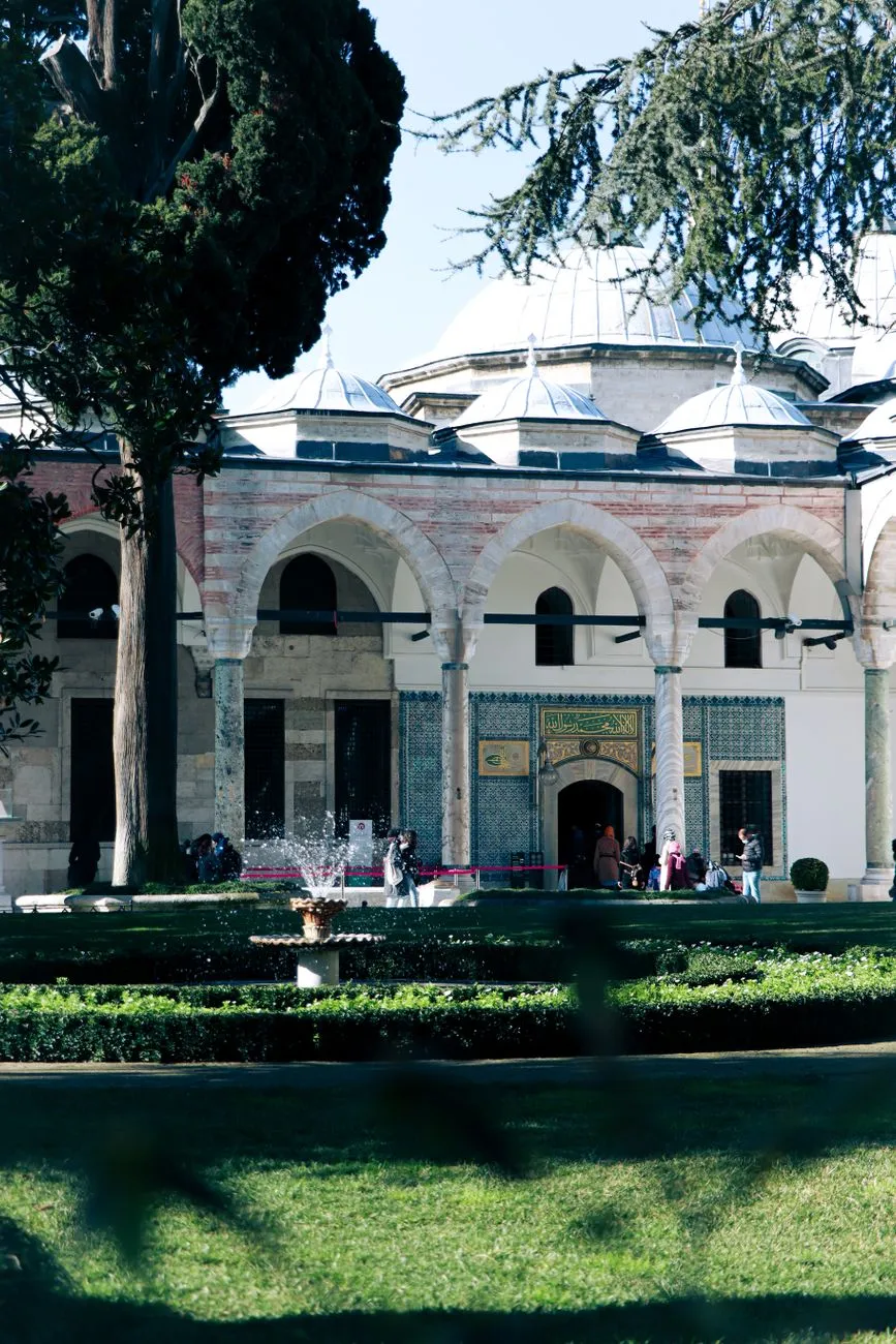 Topkapi Palace courtyard with Ottoman architecture and fountains