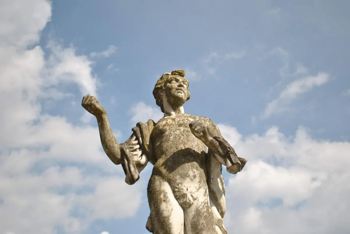 Classical sculpture of a young hero