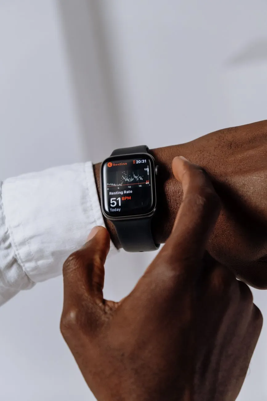 Futuristic smartwatch displaying health metrics