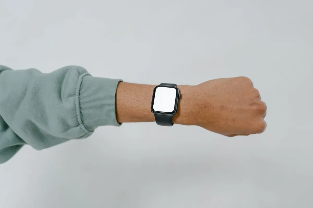 User interacting with wearable health device