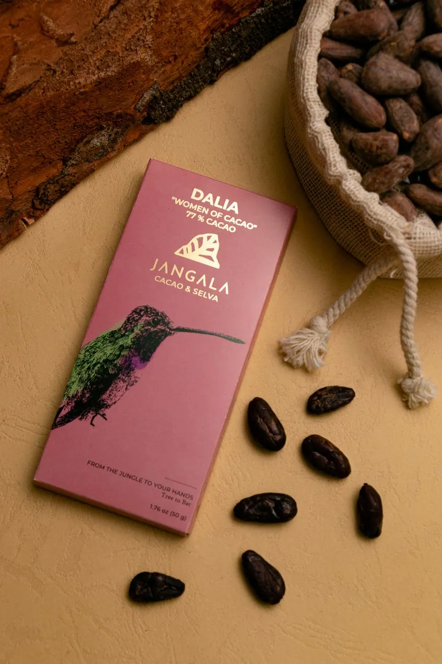A close-up of a hand holding a single cacao pod, its rough texture contrasting with the smooth, polished surface of a handcrafted chocolate bar