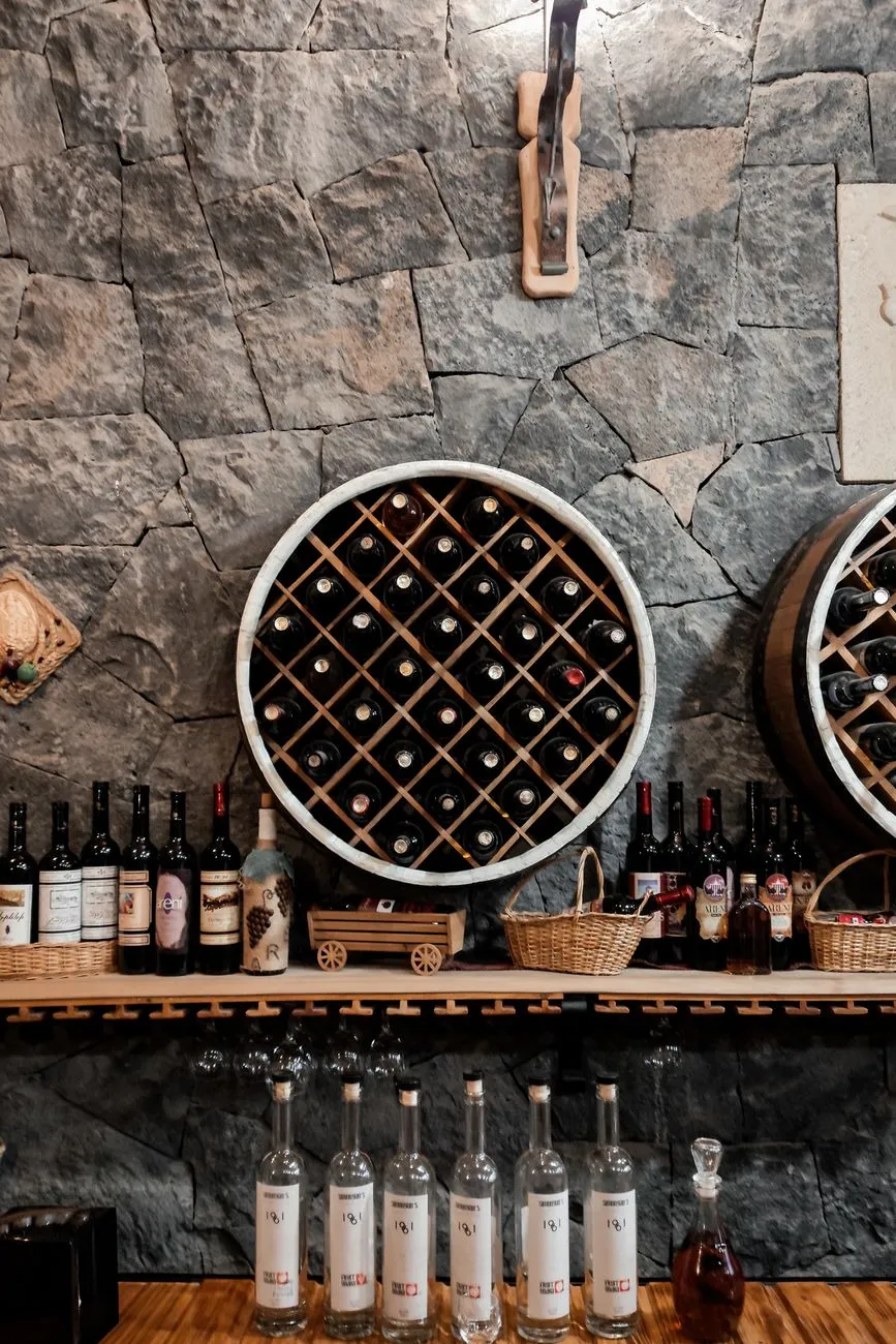 Traditional qvevri wine cellar in Georgia with clay jars buried in the ground