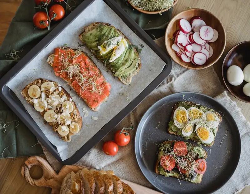 Hannah Weber's Guide to Delicious and Healthy Sprouted Grain Bread with Avocado and Radish (Vegan)
