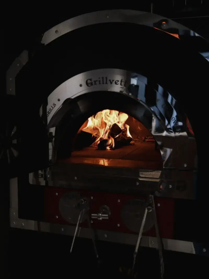 Egyptian bread being baked in a wood-fired oven