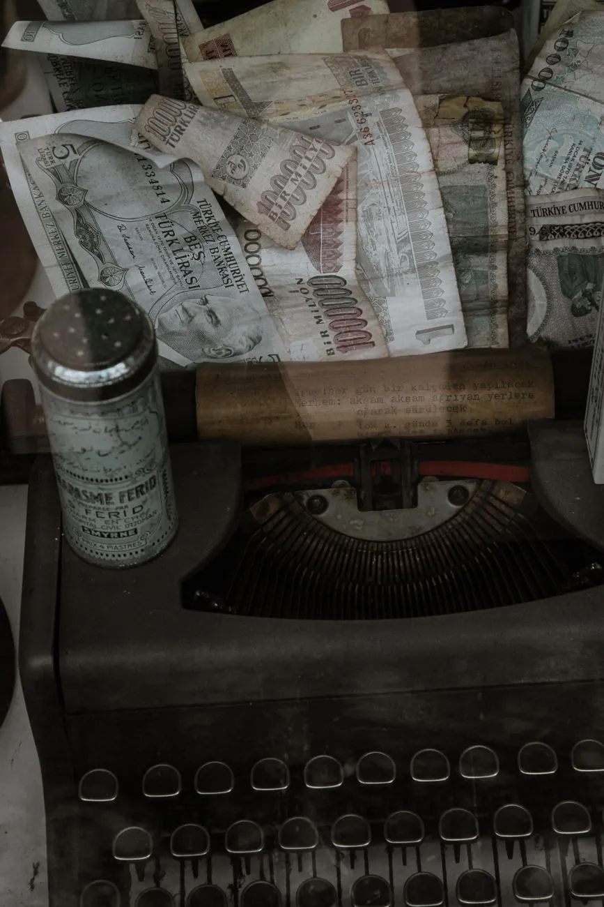 A vintage typewriter with a piece of paper sticking out