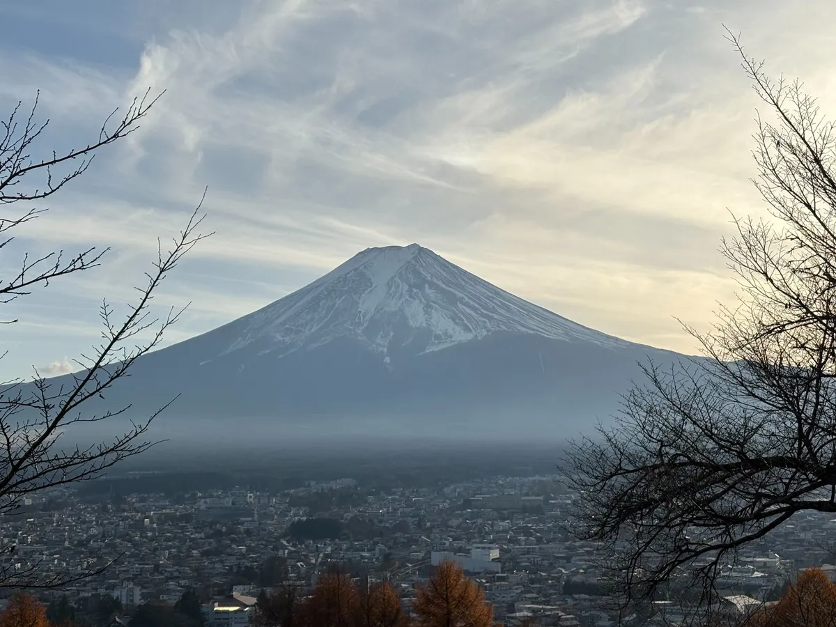 A modern coworking space with a view of Mount Fuji, blending traditional and contemporary design