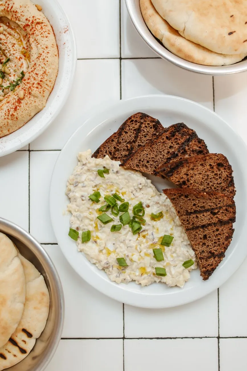 Assortment of Levantine dishes on a rustic table