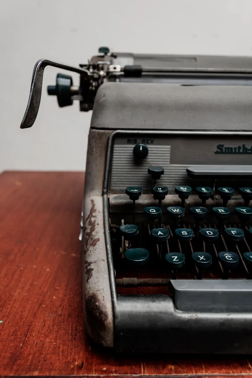 Vintage typewriter with old papers