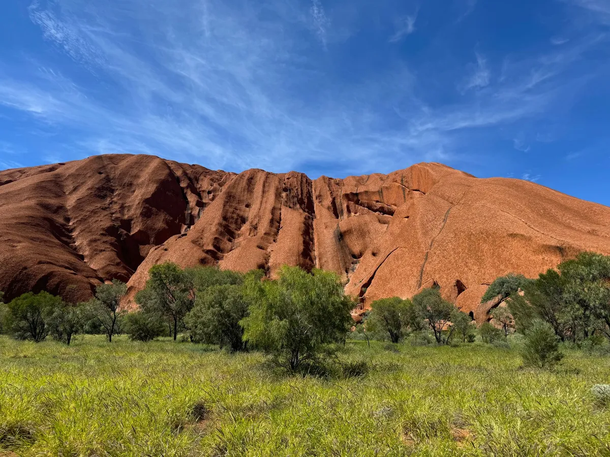 Ancient red rocks of Uluru in the outback