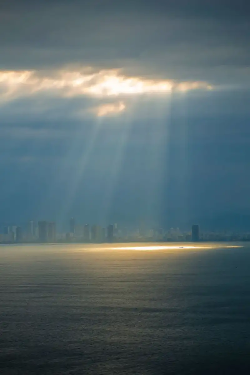 Bright heavenly light shining through clouds