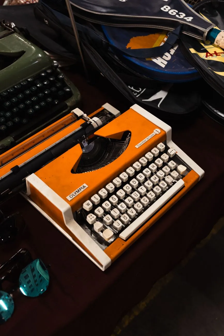 Vintage typewriter with old papers