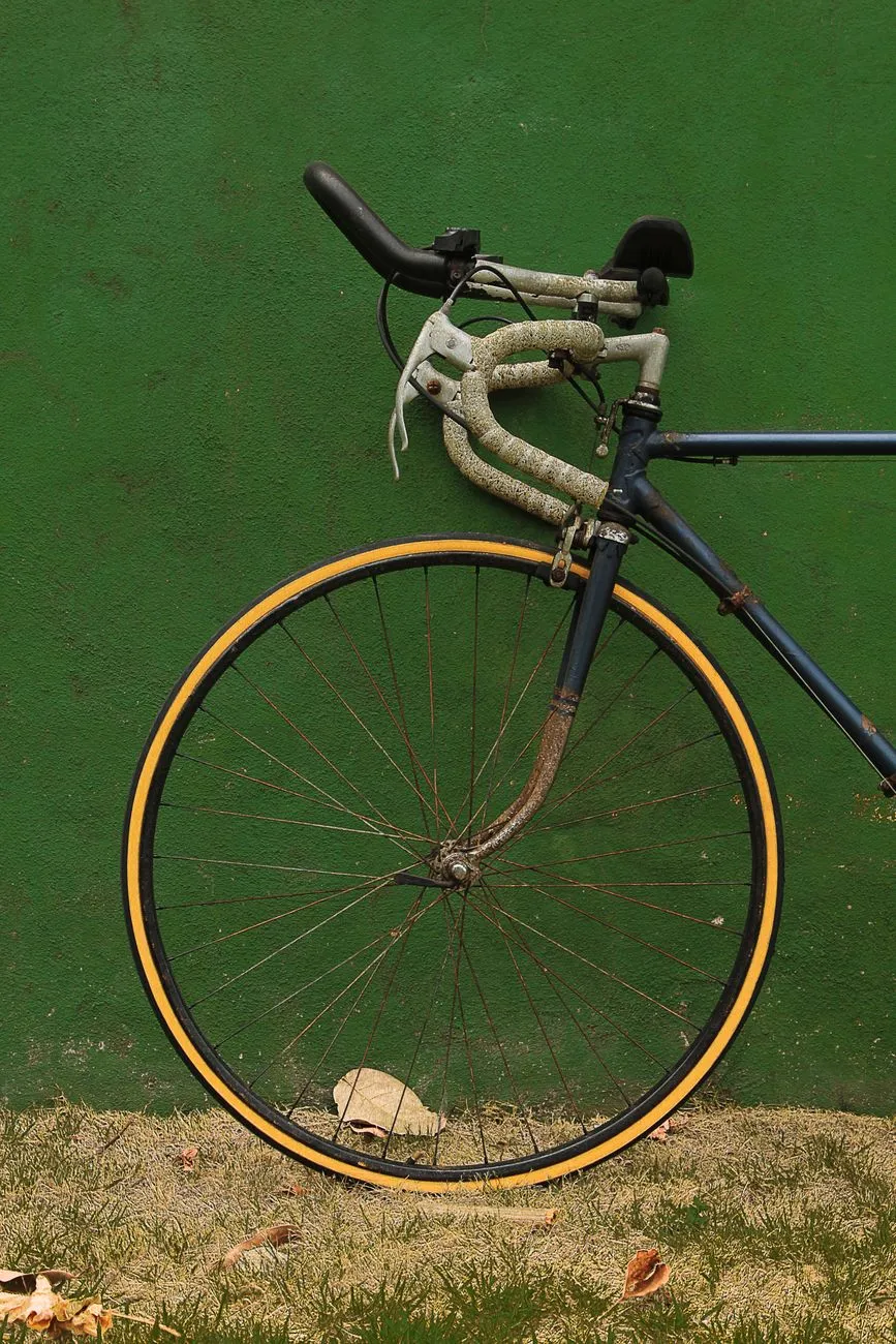 Steven Roberts cycling with early tech equipment