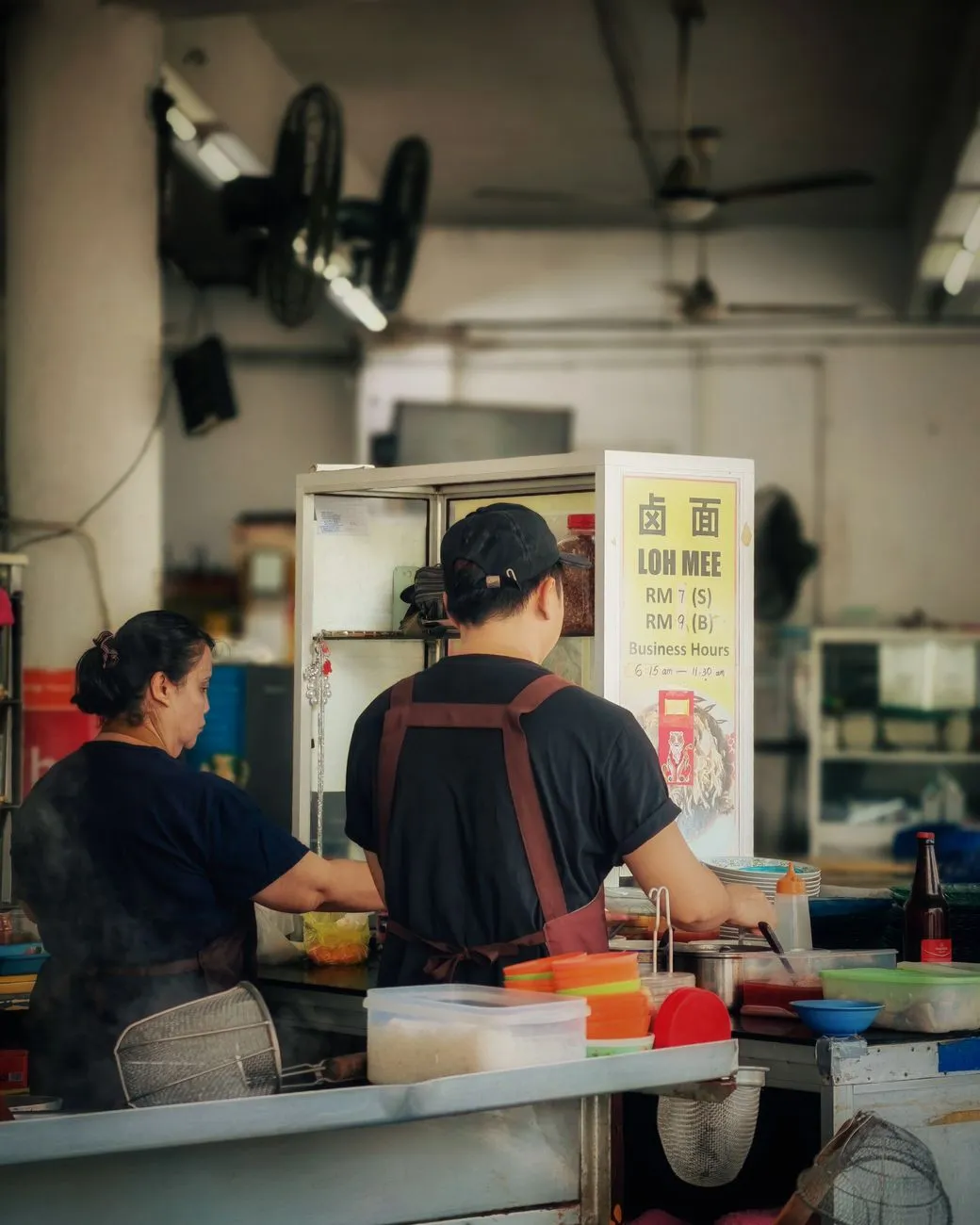 A bowl of Laksa served in a Singaporean hawker center
