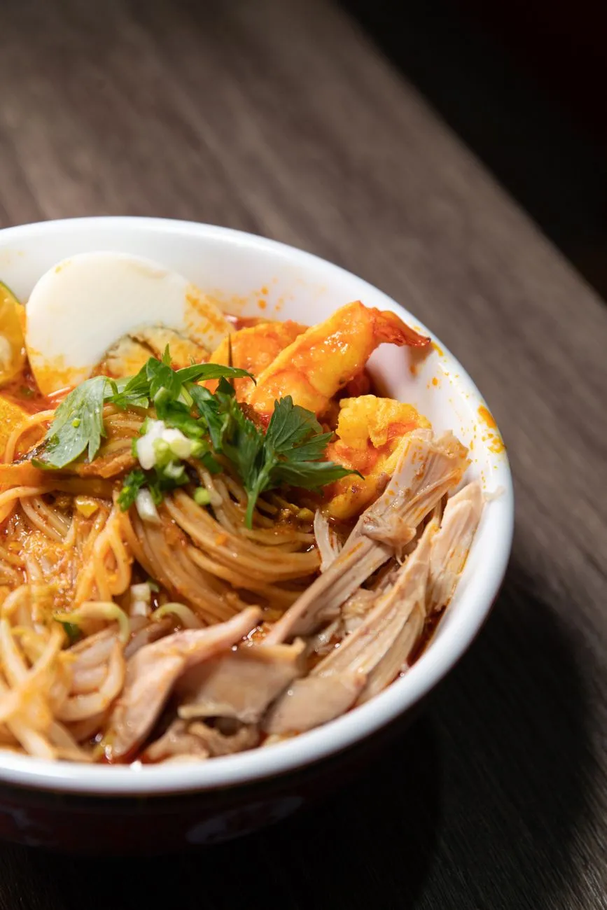 A home-cooked bowl of Curry Laksa