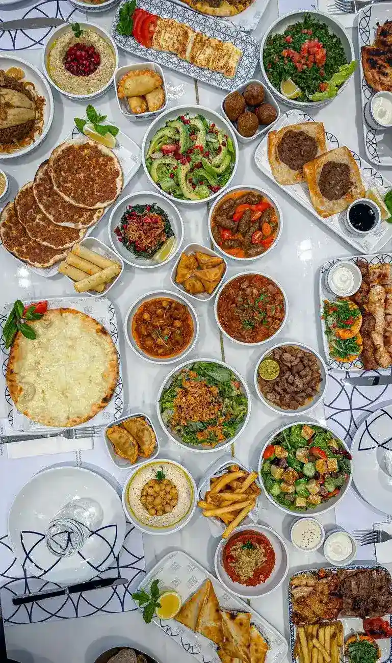 A platter of Lebanese mezze with hummus, baba ghanoush, and kibbeh