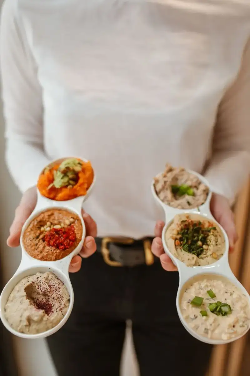A beautifully arranged mezze spread with colorful dishes and garnishes