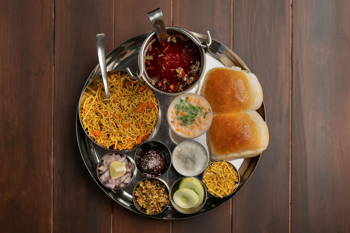 Crispy vada pav sandwich with green chutney