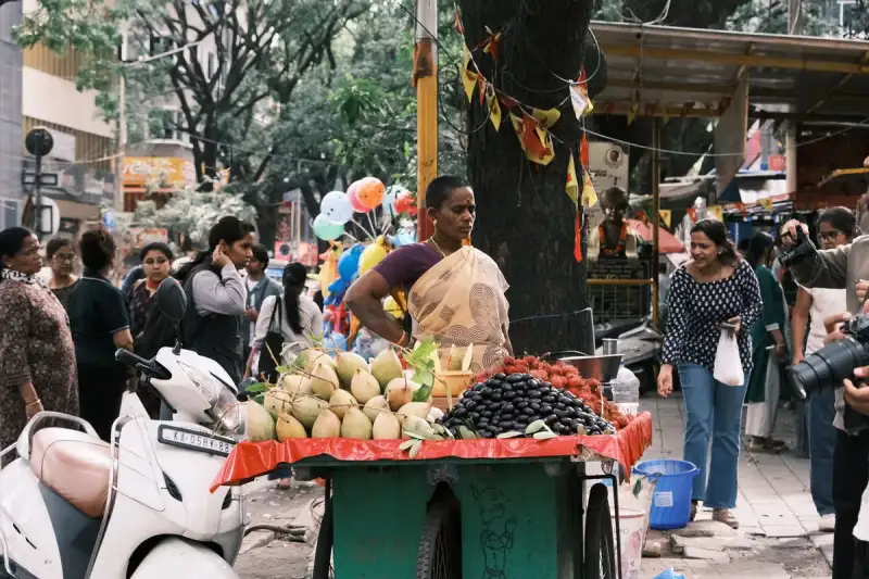 A street food vendor preparing Pani Puri