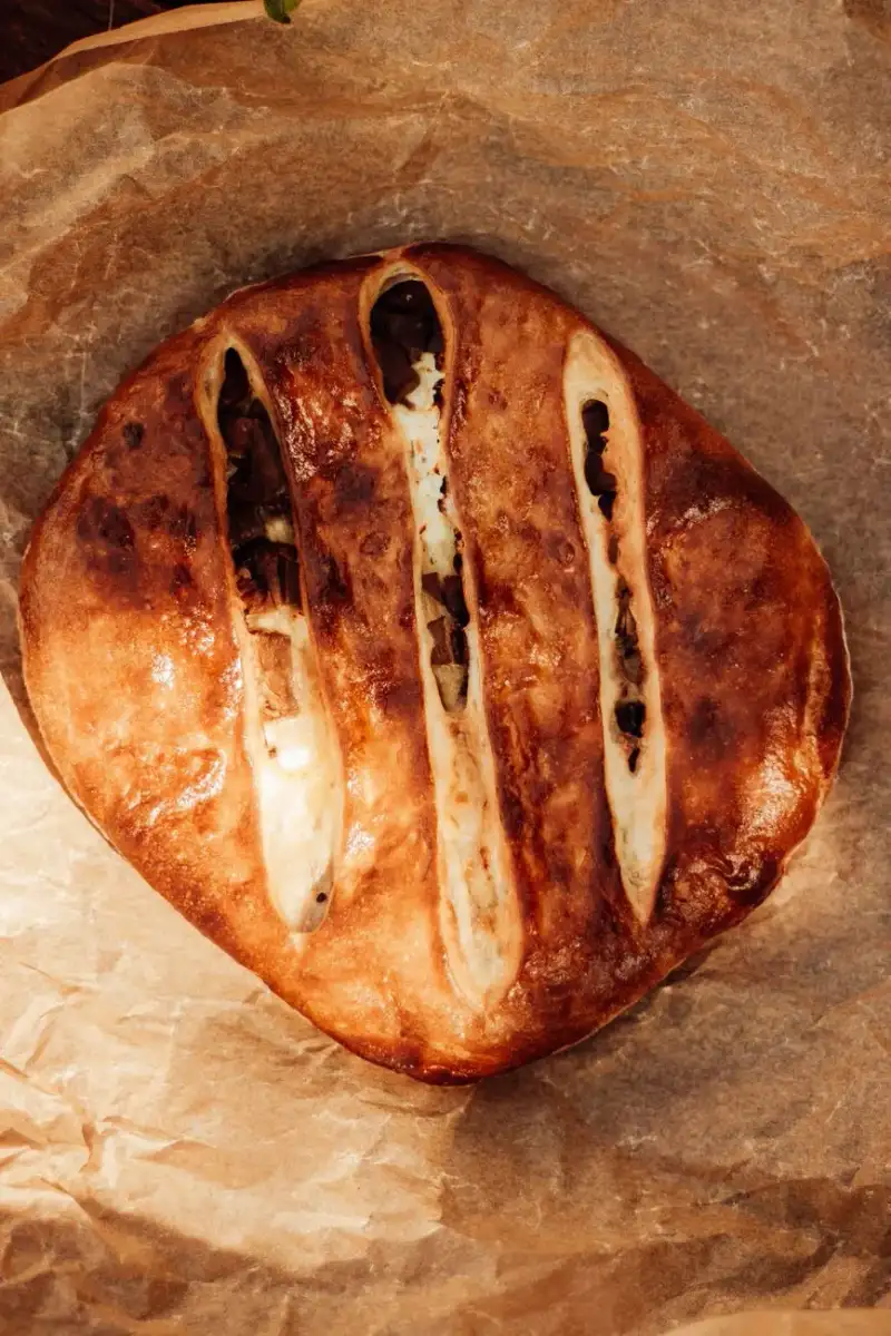 Kulebyaka on a baking sheet