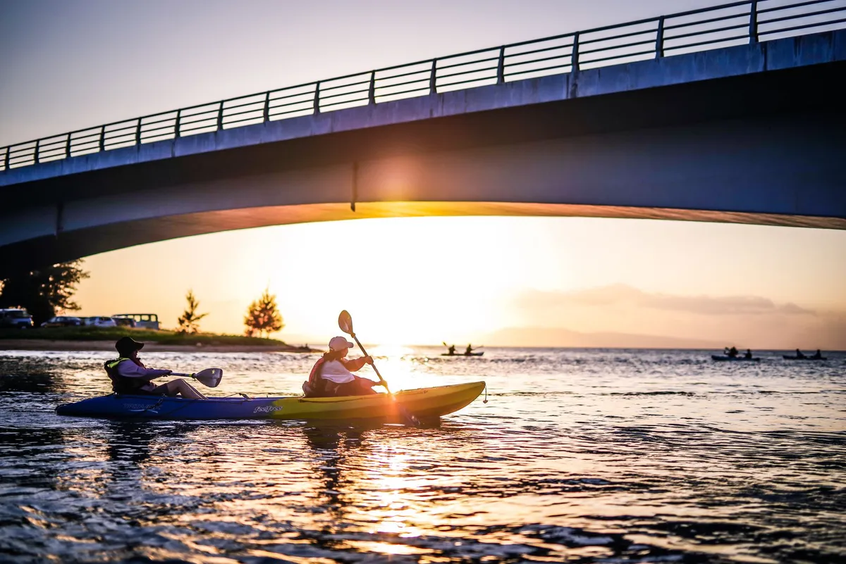 Kayaker navigating crystal lagoon in Faial