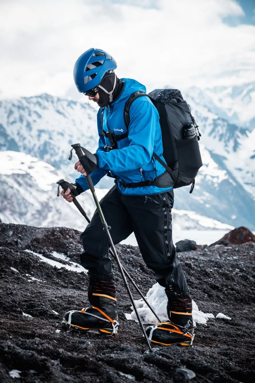 Group of hikers on a glacier with crampons