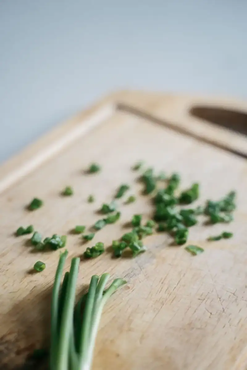 Chopping fresh herbs for Tabbouleh