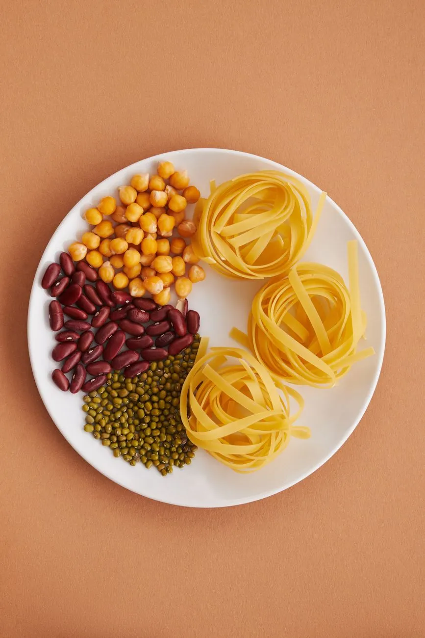 Close up of chickpeas and lentils mixed with pasta