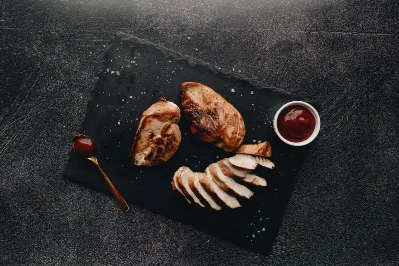 Succulent grilled chicken being prepared