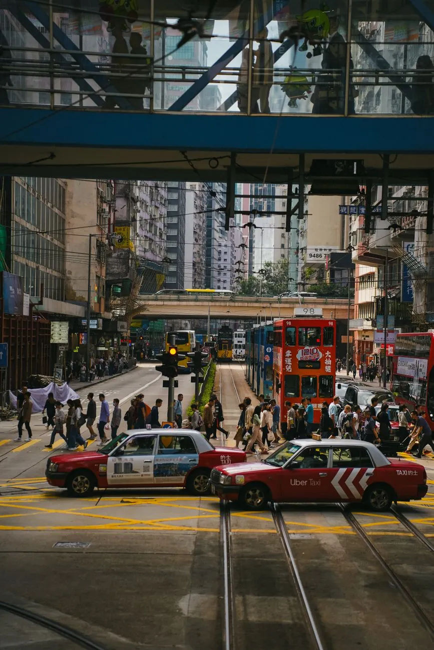 A bustling Hong Kong teahouse with steam rising from bamboo steamers