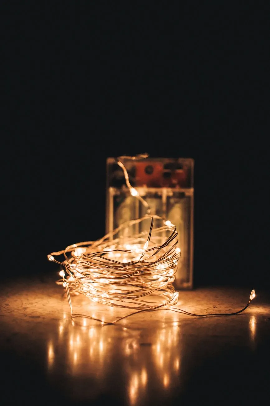 Close-up of a futuristic battery with glowing terminals