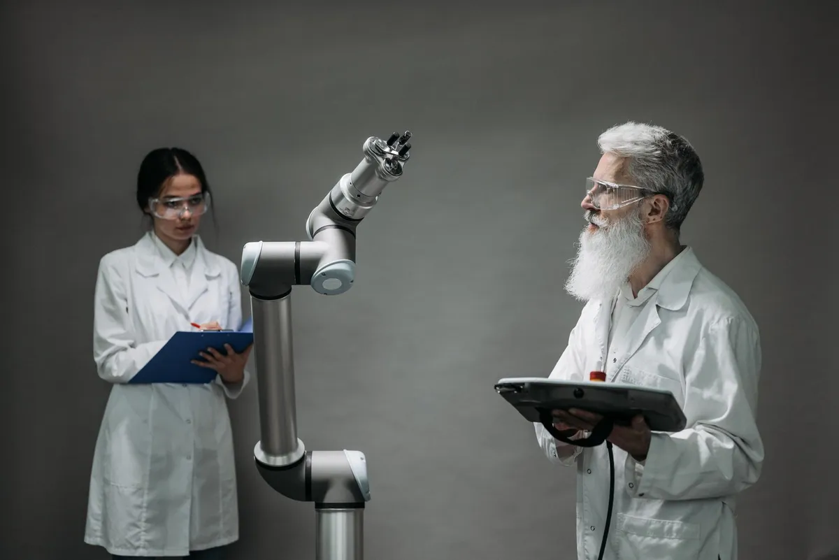 Engineers working on robotic hardware