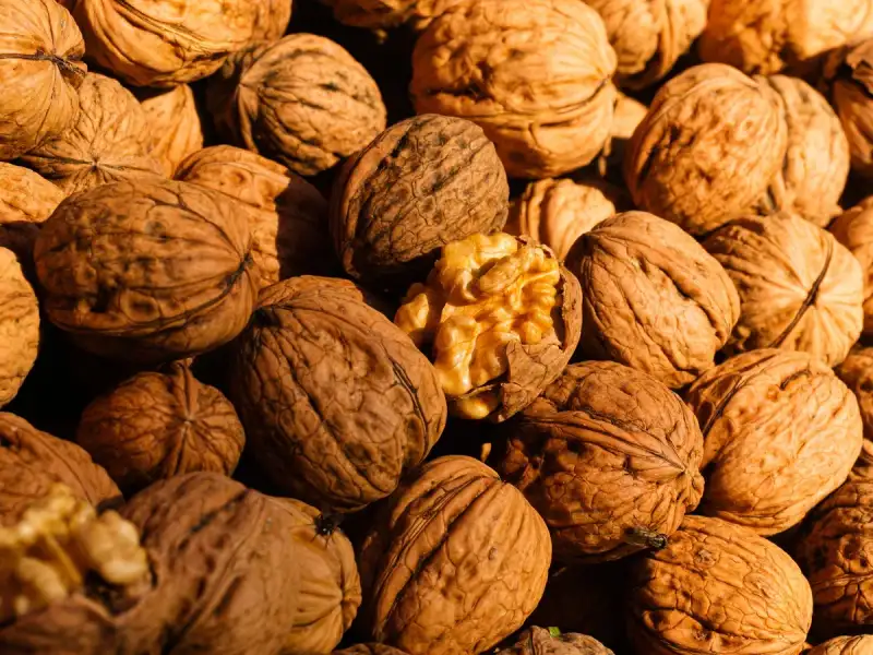 A close-up of walnuts, highlighting their healthy texture