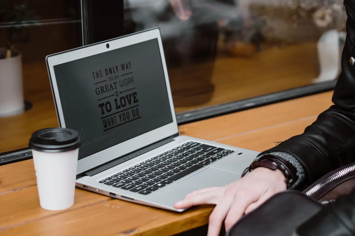 Co-working space in Siem Reap with laptop and coffee