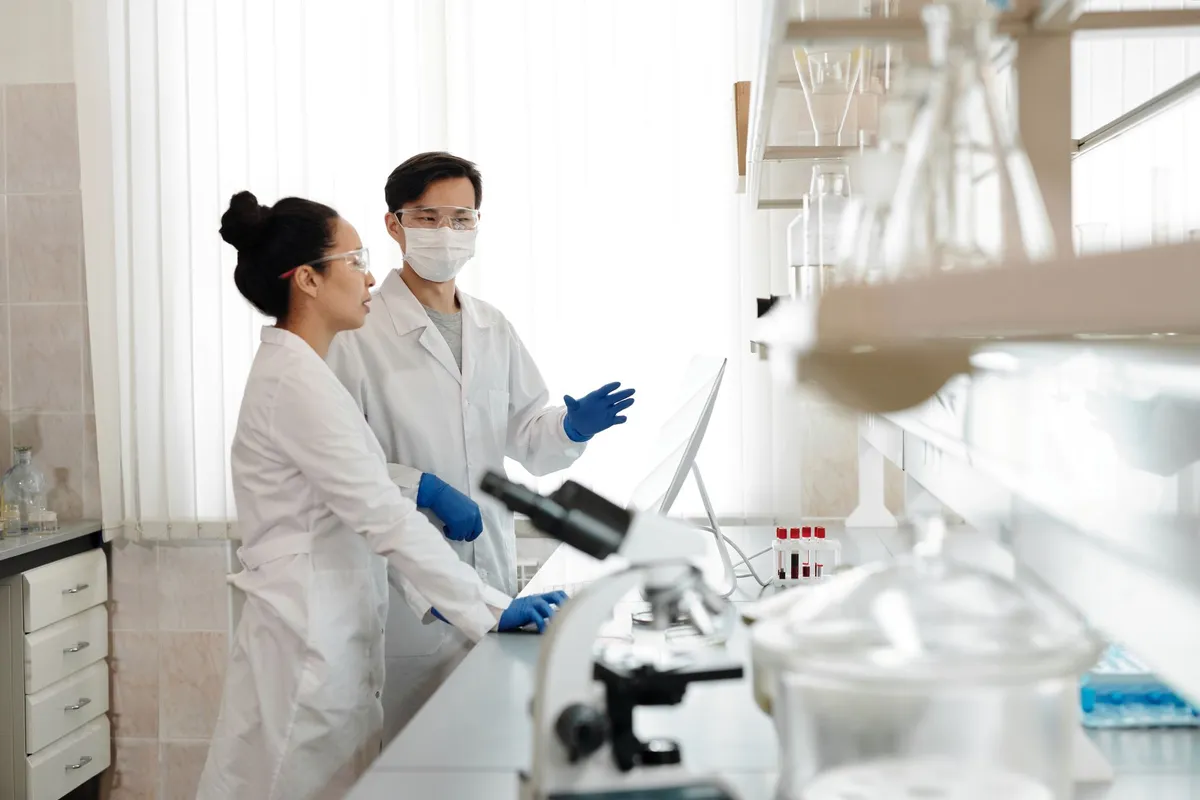 Professor Ikeda analyzing kombu dashi in a traditional japanese laboratory setting